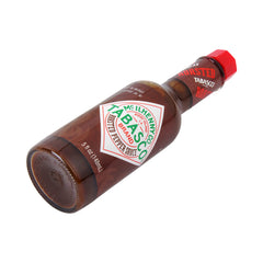 TABASCO Roasted Pepper Sauce bottle with peppers suggesting smoky notes.