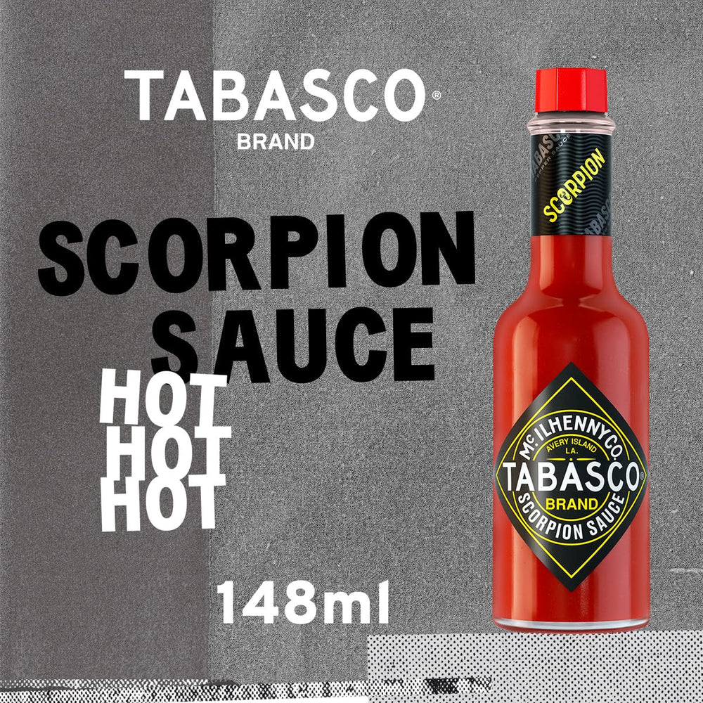 Tabasco Scorpion Hot Sauce pour detail over a dish.