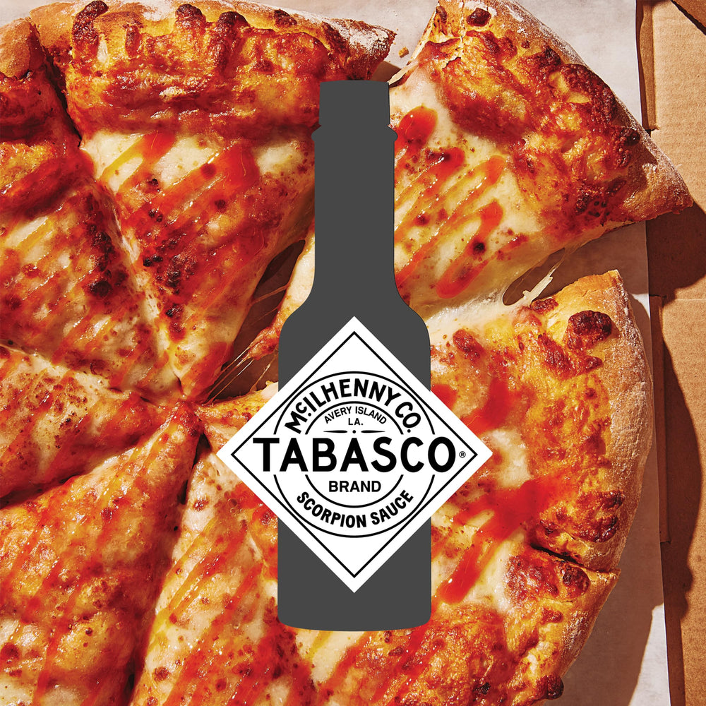 TABASCO Scorpion Sauce bottle on counter ready for bold cooking.
