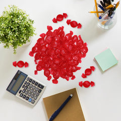 Taboom bright red cinnamon candies arranged for a party display.