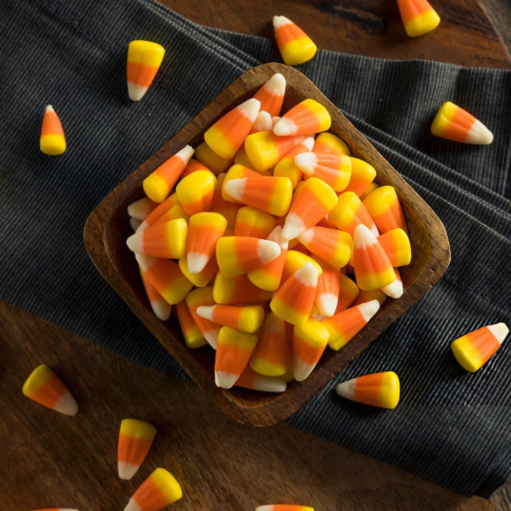 Taboom party-favor candy corn bags for guests' sweet take-home.