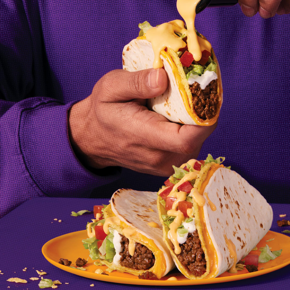Dinner setup with shells, tortillas, sauce, and toppings for a hands-on meal