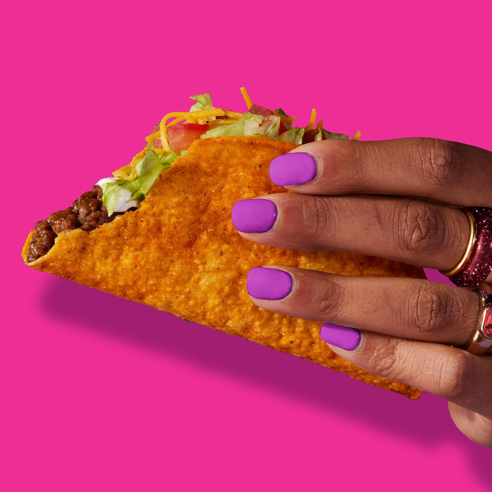 Protein filling prepared with signature Taco Bell seasonings for flavorful tacos.
