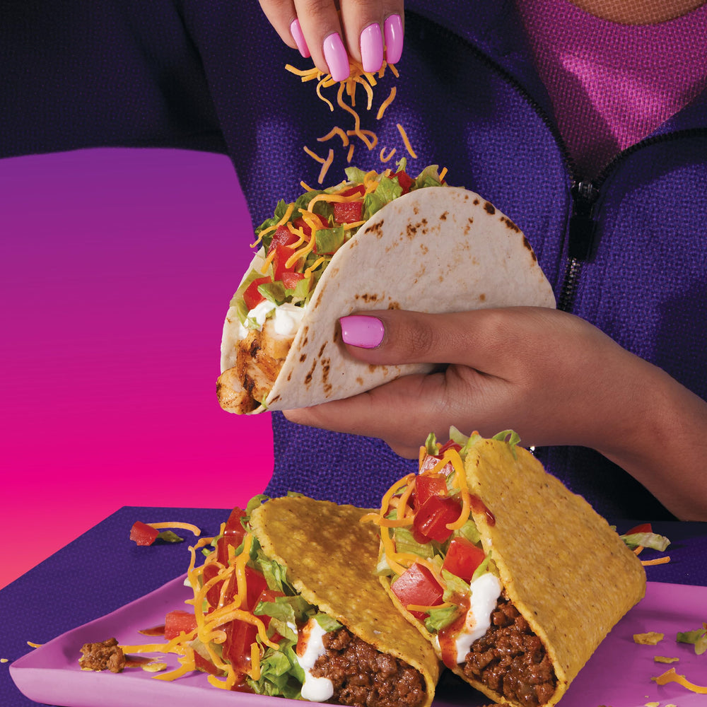 Taco Bell Toppings setup with cheese and veggies for customization.