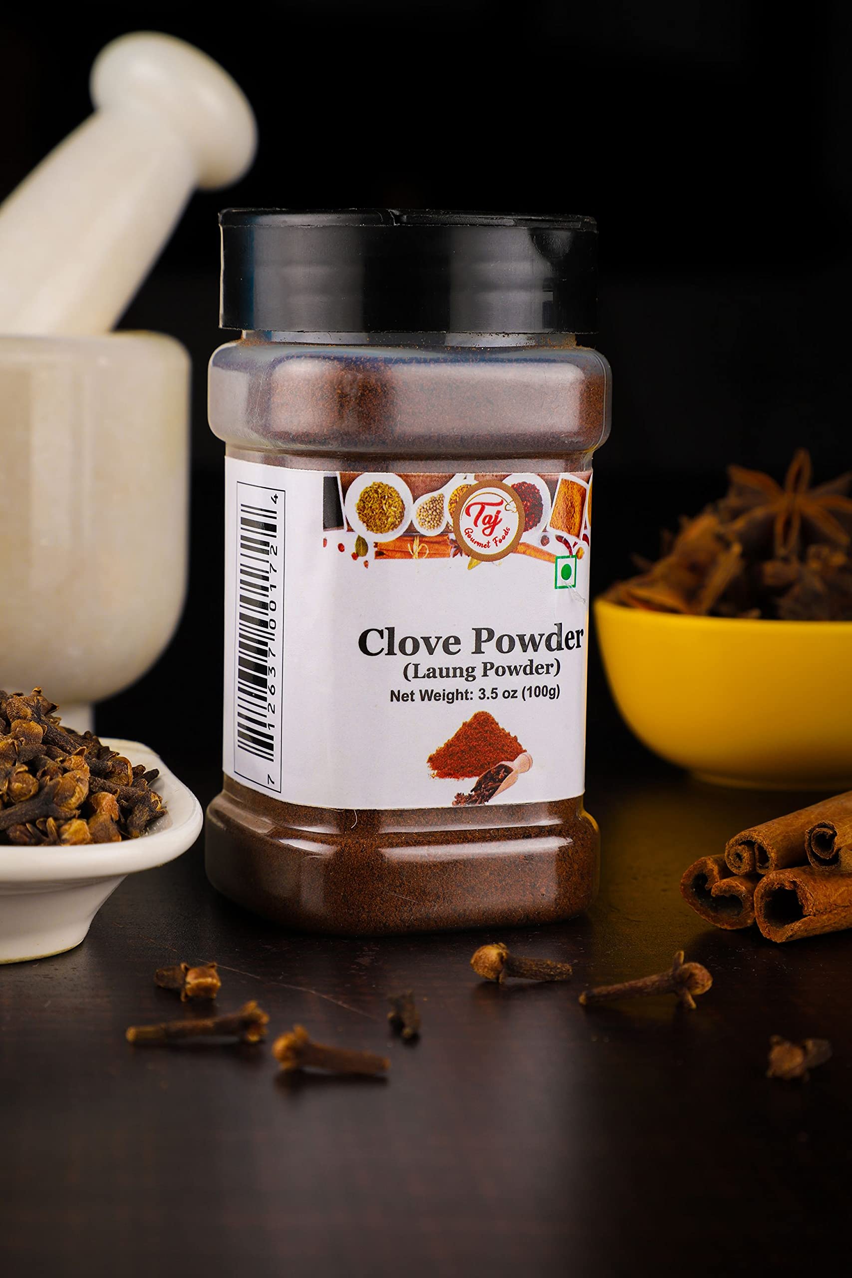 TAJ Gourmet Clove Powder brewed tea mug for warming beverages.