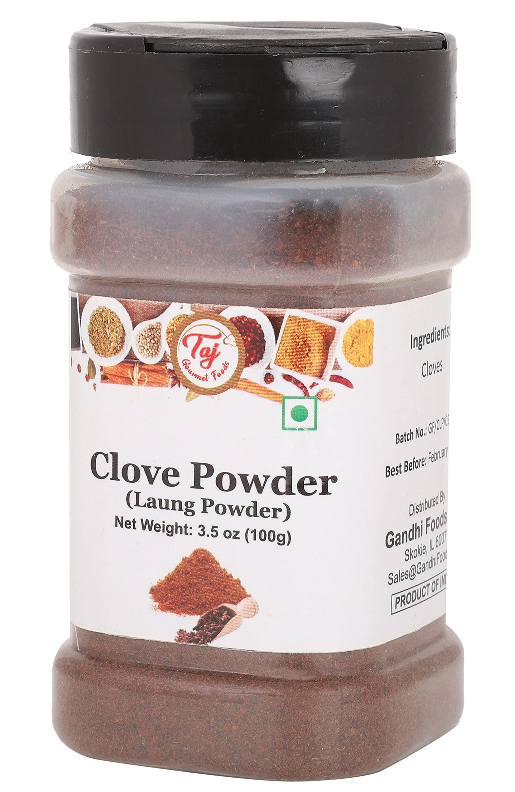 TAJ Gourmet Clove Powder pouring from bottle for easy seasoning.