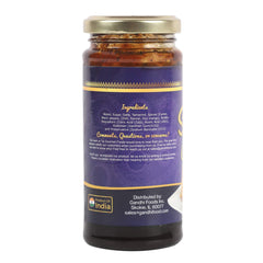 TAJ Gourmet Samosa Chutney spoon-dip demonstrates convenient serving for snacking