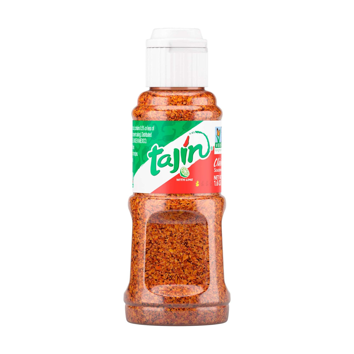 Tajin Classic mini bottle pours on fruit for a bright lime kick