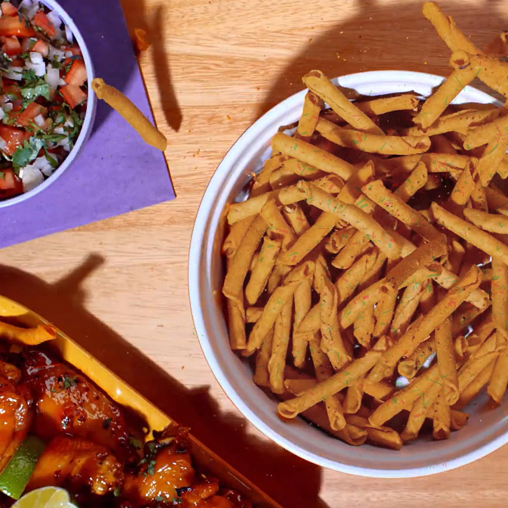 Takis Buckin' Ranch chips mixed with nuts and popcorn for versatile snacking