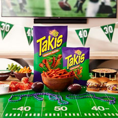 Takis Crunchy Fajitas dipped into salsa showing brand and sturdy scoop capability