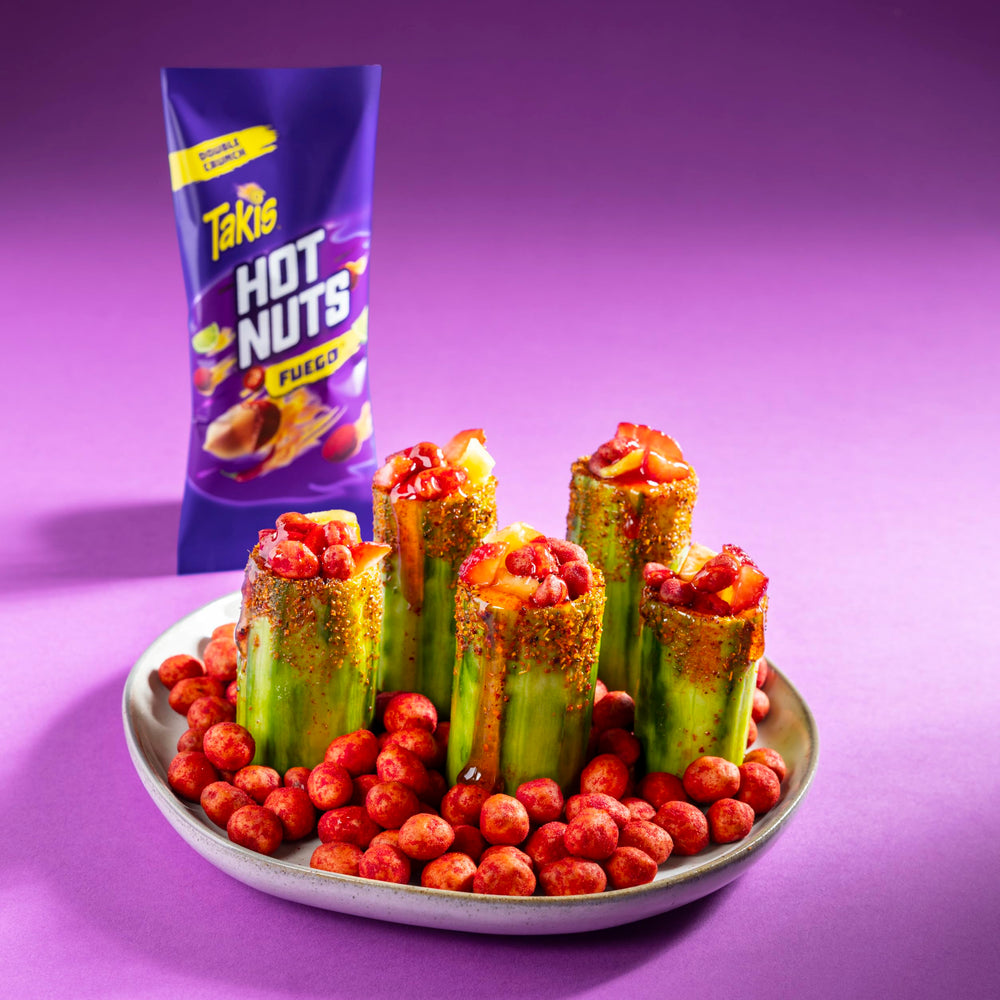 Takis Fuego Hot Nuts sharing platter with friends