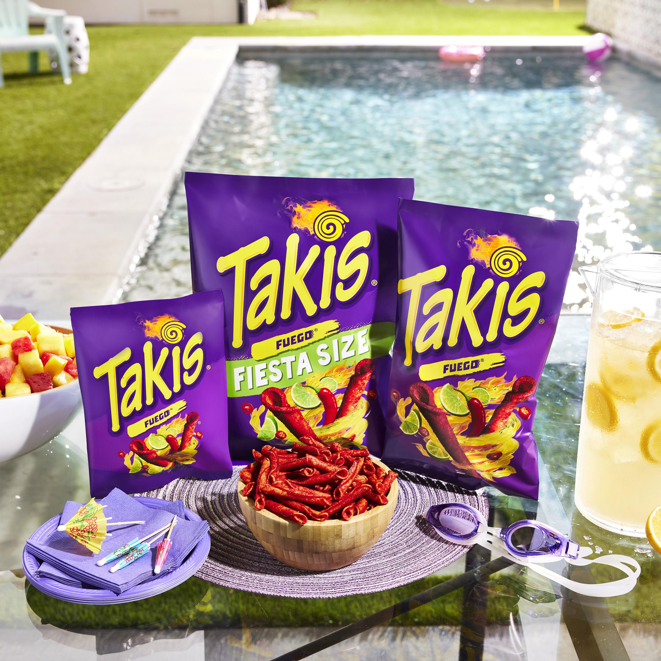 Takis Fuego rolled chip texture close-up emphasizing crunchy seasoned surface