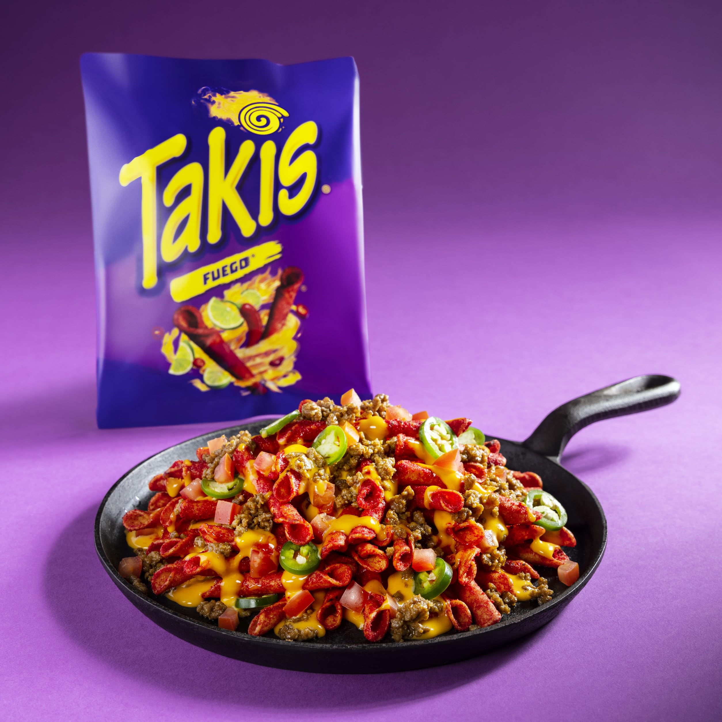Takis Fuego held in hand for size comparison showing easy on-the-go benefit