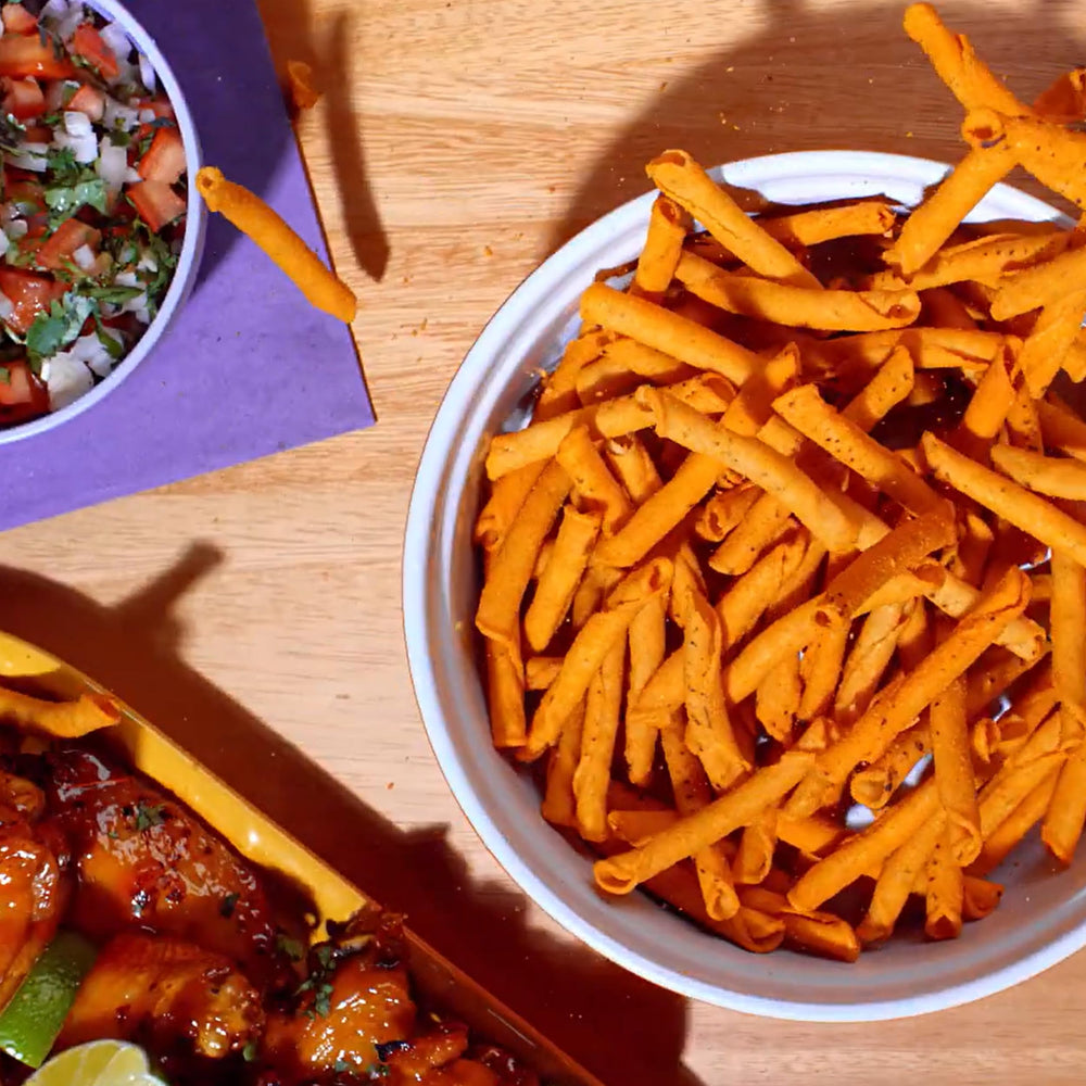 Takis Intense Nacho packaging close-up emphasizes fiesta-size bag for big cravings.
