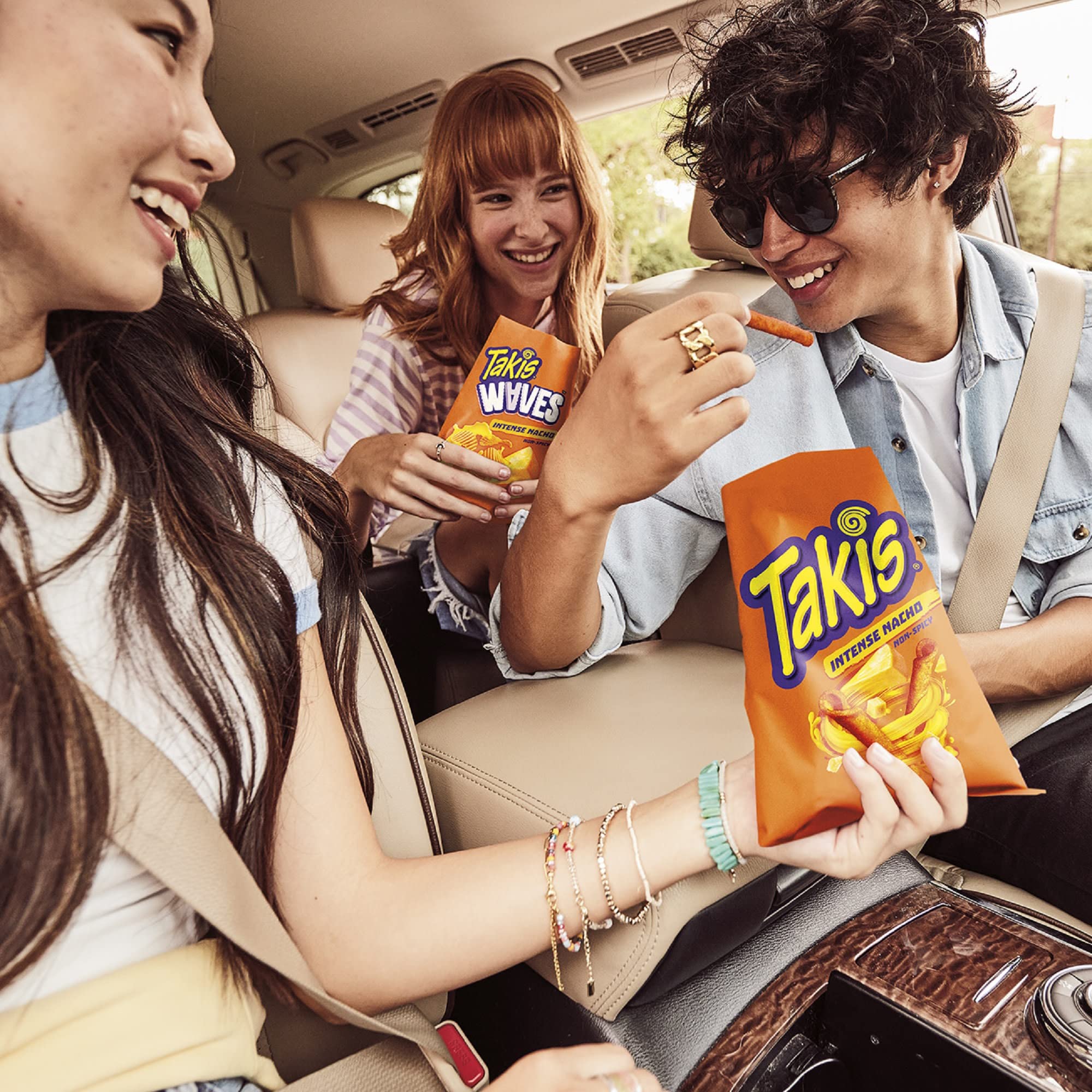 Takis Intense Nacho at a party table with bold crunch.