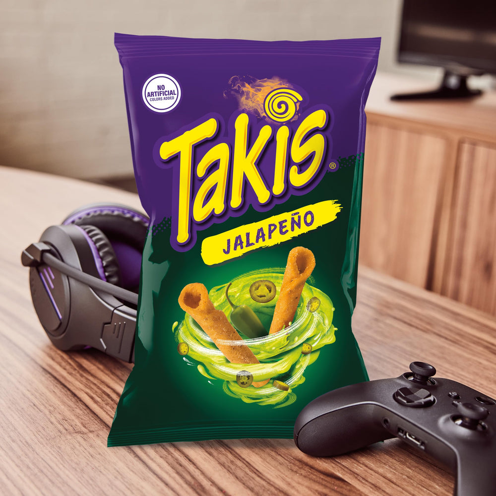 Takis seasoning granules on chip close-up highlights pickled jalapeño flavor benefit