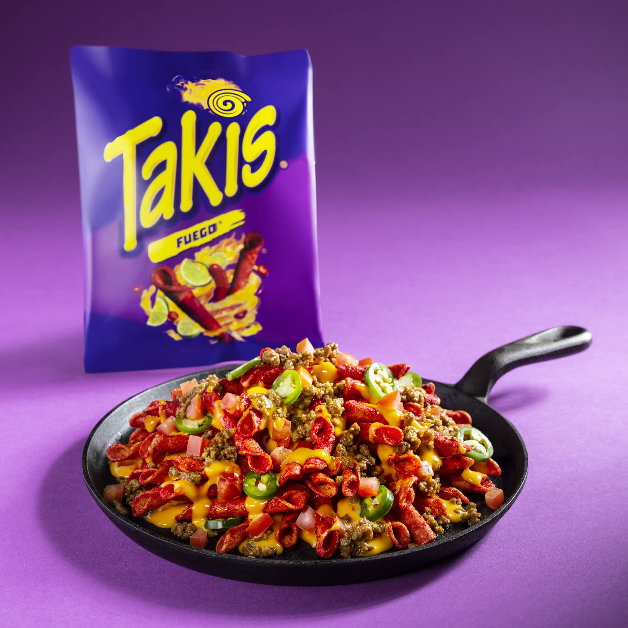 Takis Nitro on party table elevating snacks with spicy, zesty flavor