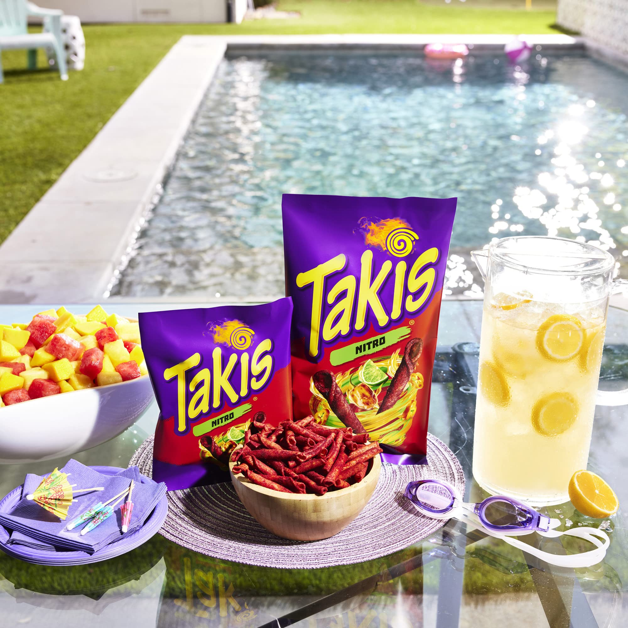 Hand holding Takis bag to show 9.9 oz sharing size and portion clarity