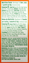 Close-up of Tang orange packets highlighting vivid powder and easy dissolving.