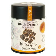 The Tao of Tea Black Dragon Oolong tea leaves unfurling to release a rich aroma.