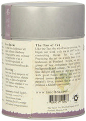 The Tao of Tea Cranberry Orange tea brew showcasing a vibrant rose-colored infusion.