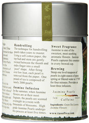 The Tao of Tea jasmine flowers steeping, releasing fragrant aroma and bright notes.