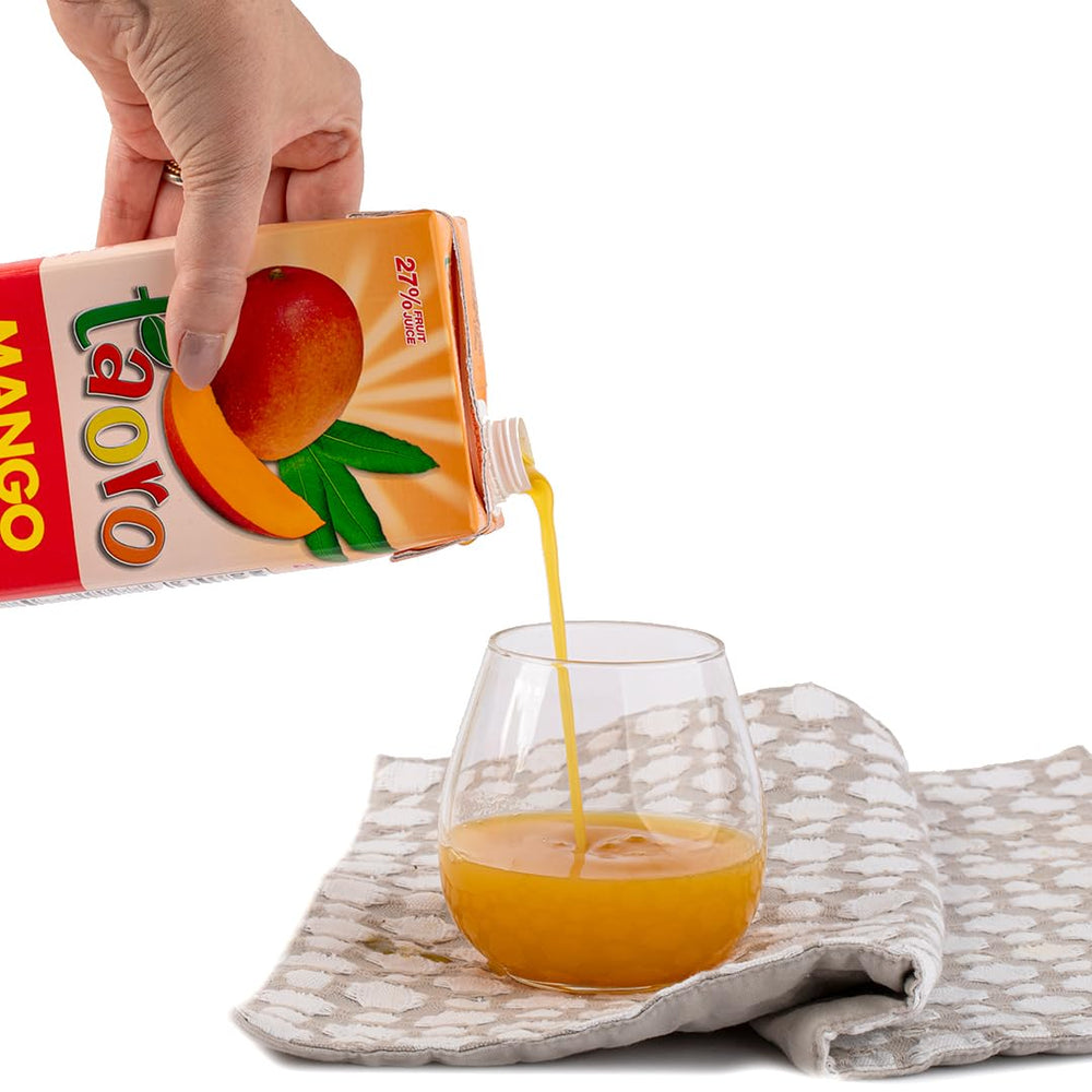 Taoro Mango Nectar in a glass as a tropical drink option.