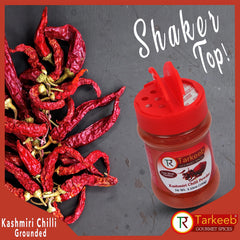 Tarkeeb Kashmiri chili powder close-up emphasizes rich red color.