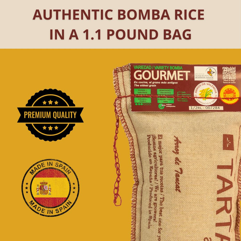 TARTANA Bomba rice in paella dish showcases grains staying separate and fluffy.