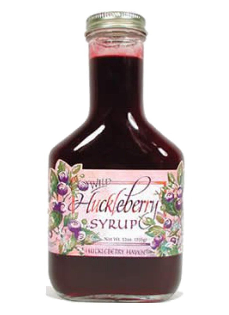 Taste the Wilderness Wild Huckleberry Syrup 12oz bottle pour enhances pancakes with fruity sweetness