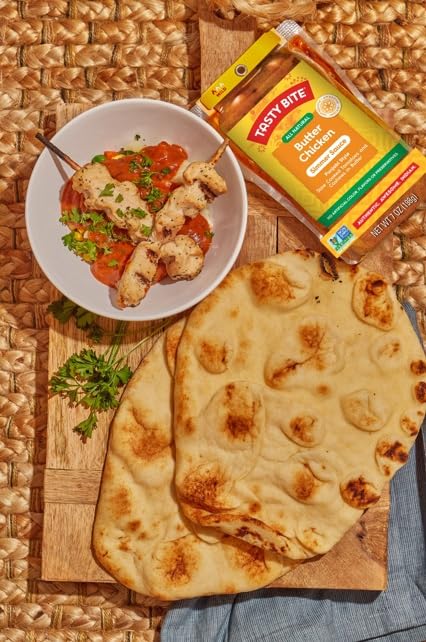 Kitchen scene with Tasty Bite ingredients — preparing an all-natural Indian meal at home