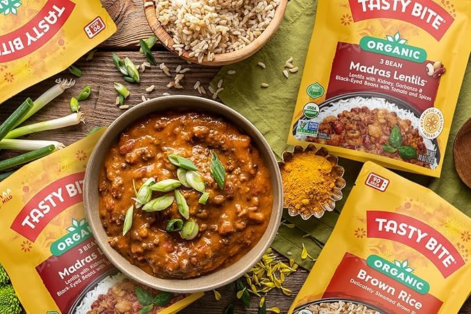 TASTY BITE Organic Three Bean Madras Lentils in pantry shelf, convenient storage option.