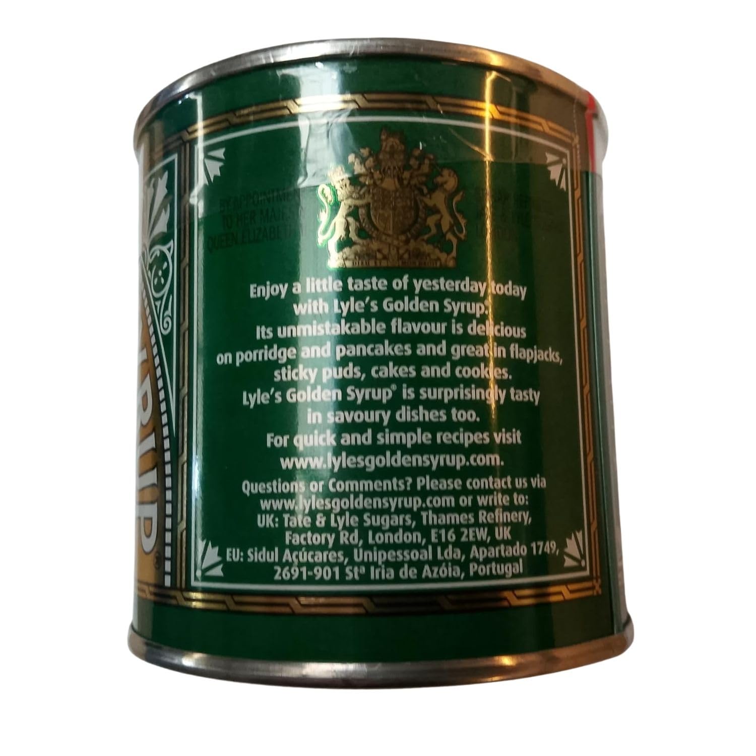 Lyle's Golden Syrup with baking scoop demonstrates versatile dessert sweetness.
