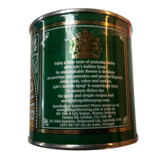 Lyle's Golden Syrup with baking scoop demonstrates versatile dessert sweetness.