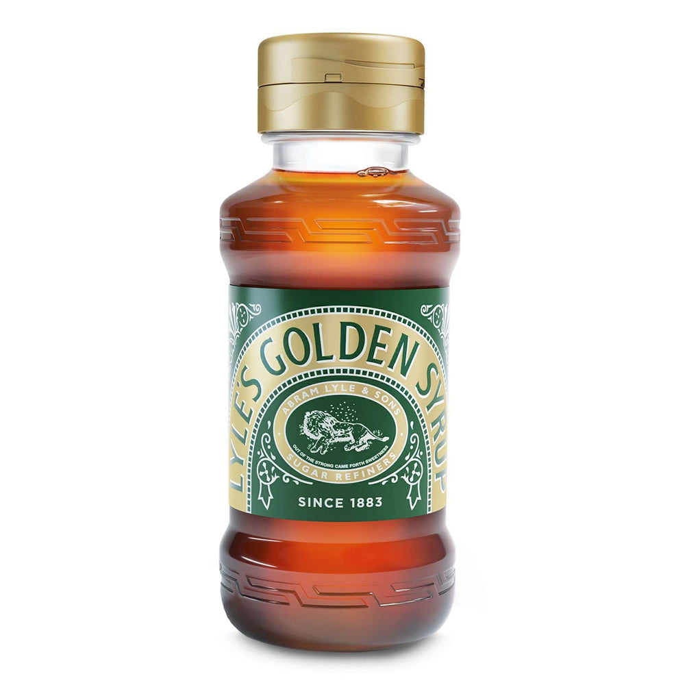Tate & Lyle Lyle's Golden Syrup two-pack bottles on the kitchen shelf.