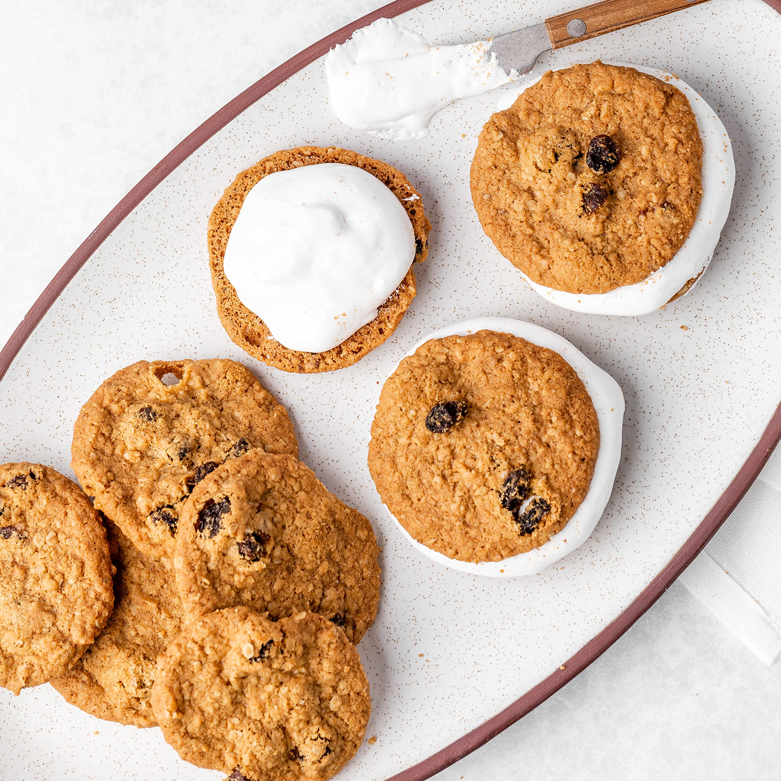Gift-ready Tate's Oatmeal Raisin Cookies packaging for sharing.