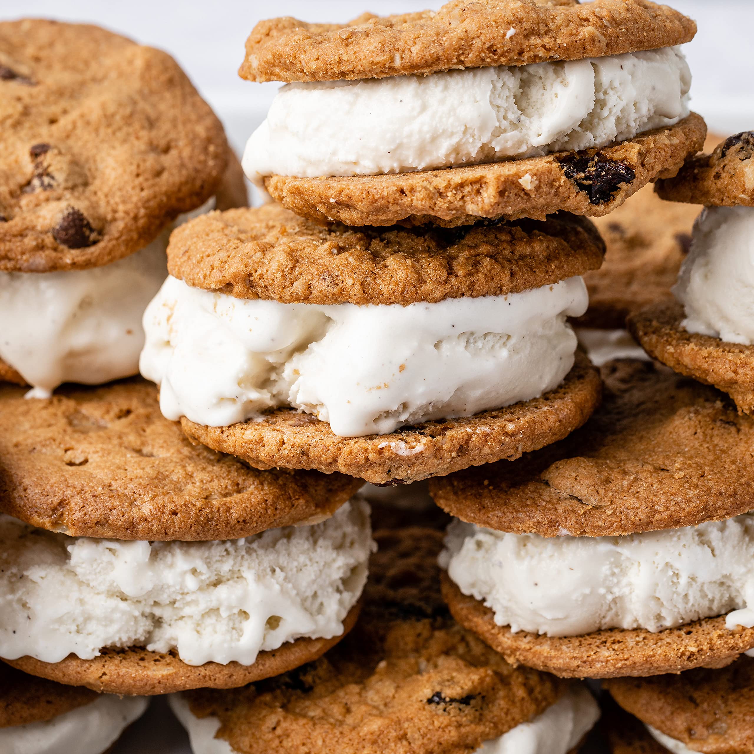 Cookies next to coffee, Tate's Oatmeal Raisin pairing idea.