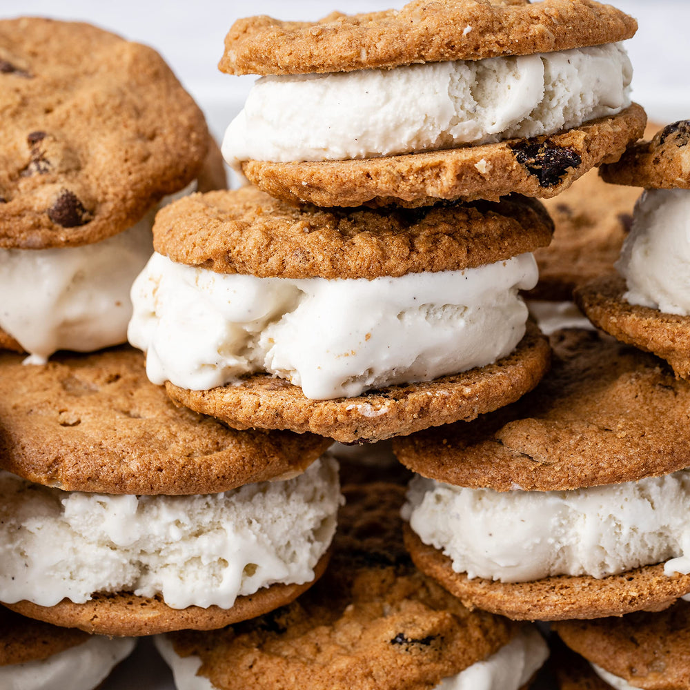Cookies next to coffee, Tate's Oatmeal Raisin pairing idea.