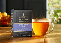 Taylors of Harrogate Earl Grey tea bag close-up showing delicate leaves for infusion.