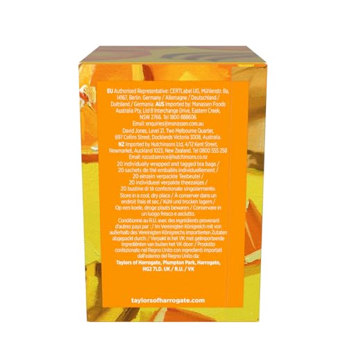 Close-up of mandarin, ginger and hibiscus ingredients blending fragrant notes