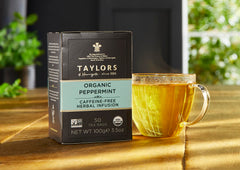 Box of Taylors organic peppermint pillow tea bags highlighting packaging and sustainability
