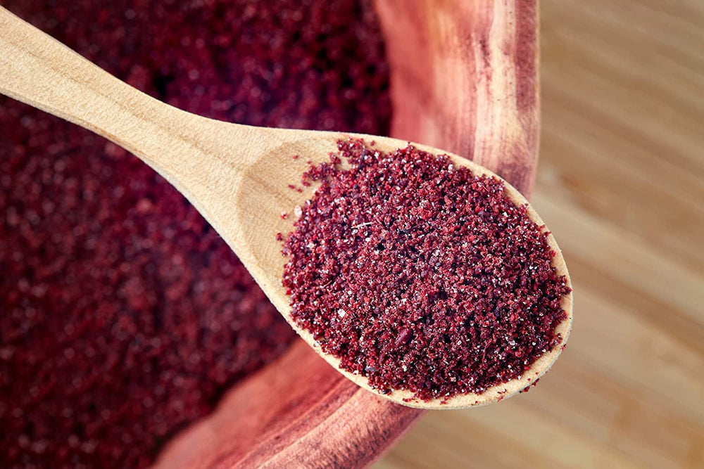 Tazah Sumac Spice dusted on hummus for citrusy tang.