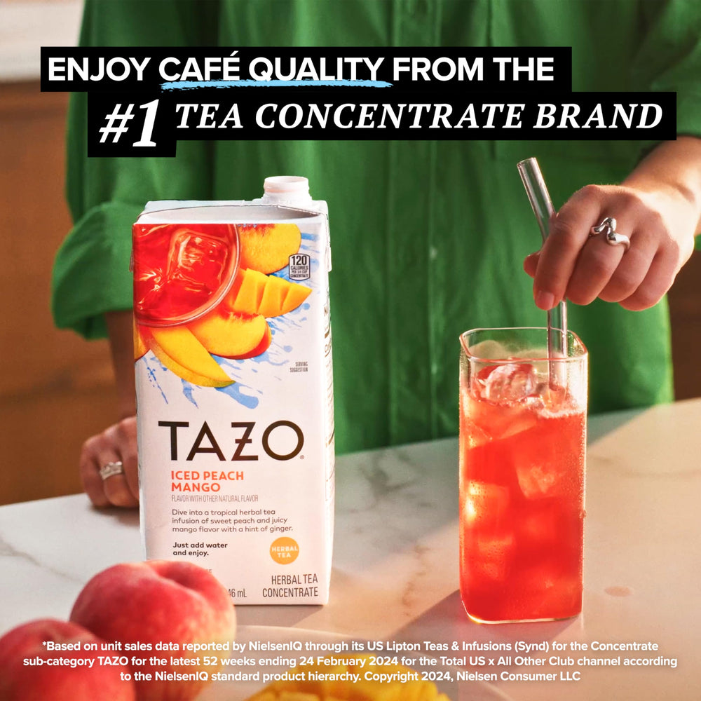 TAZO Iced Peach Mango Tea with sparkling water for a bubbly twist