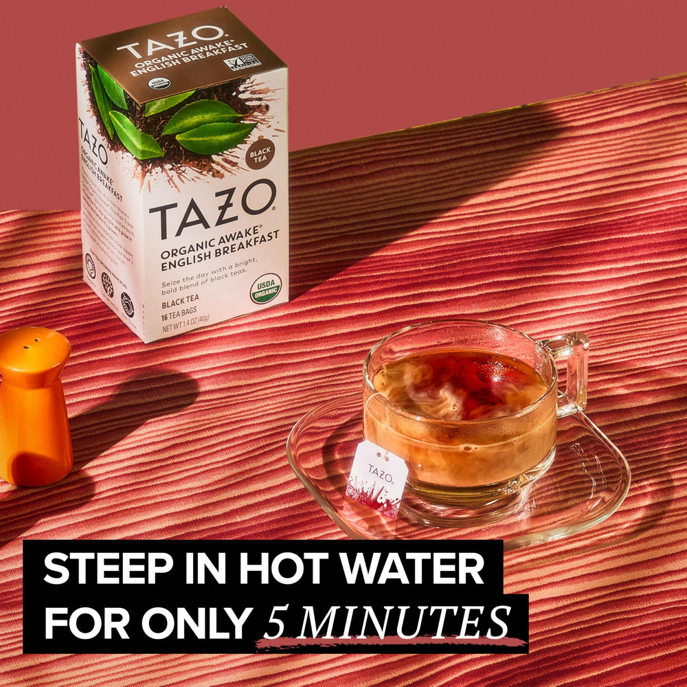 Lemon slice with hot TAZO Awake tea enhancing flavor