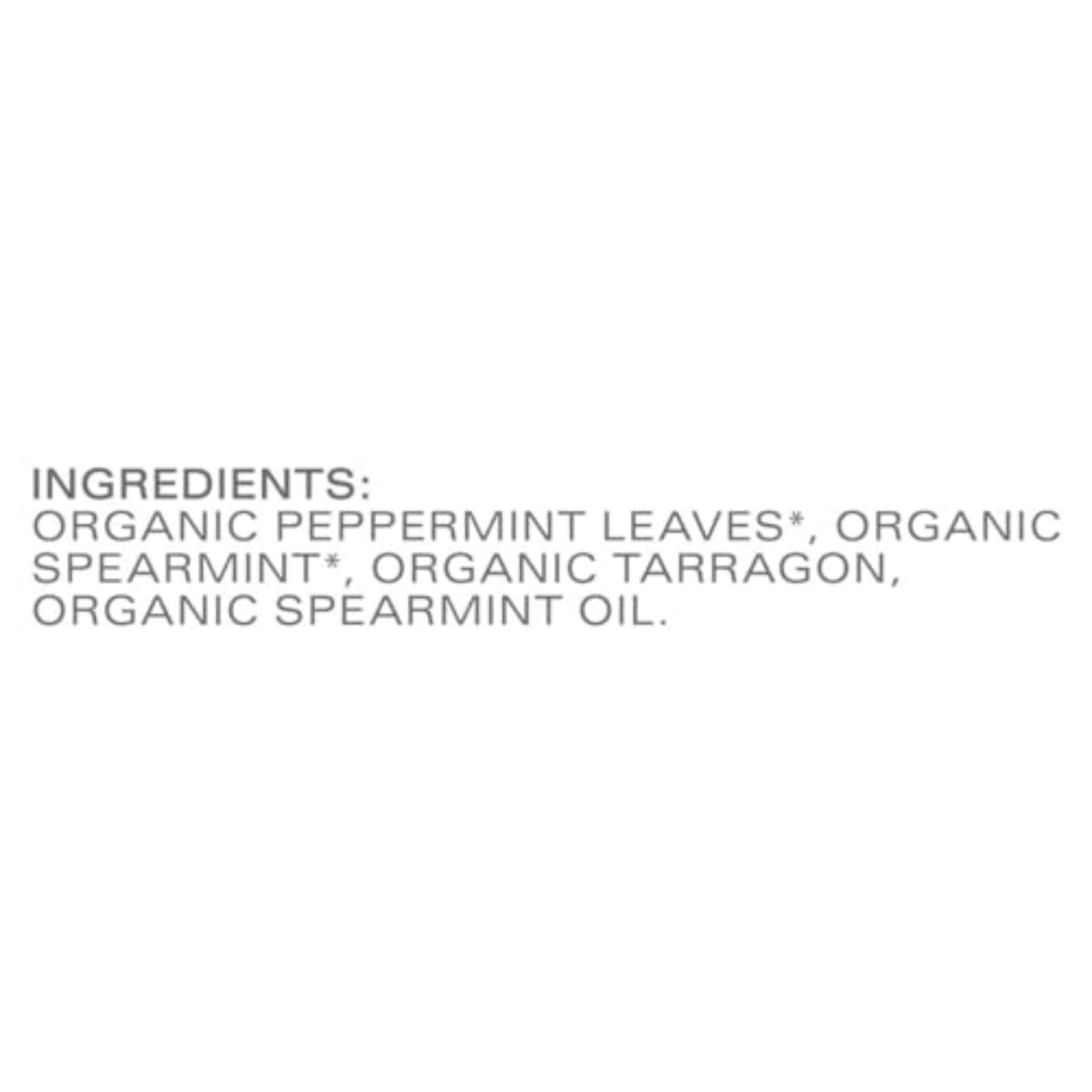 TAZO Refresh Mint tea bag steeping in hot water to release mint aroma