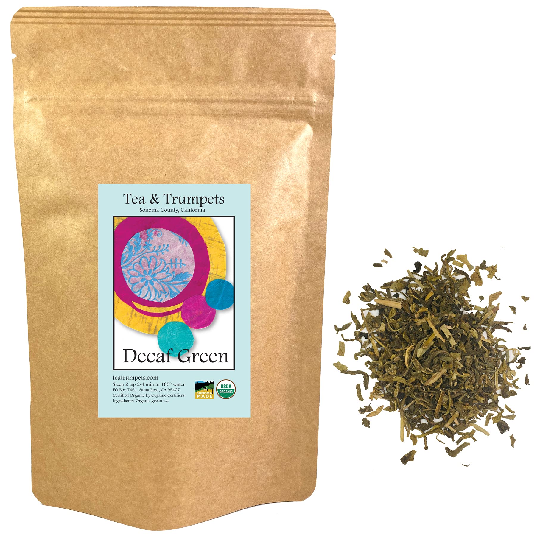 Tea and Trumpets decaf green tea leaves in a loose-leaf scoop, smooth, nutty flavor.
