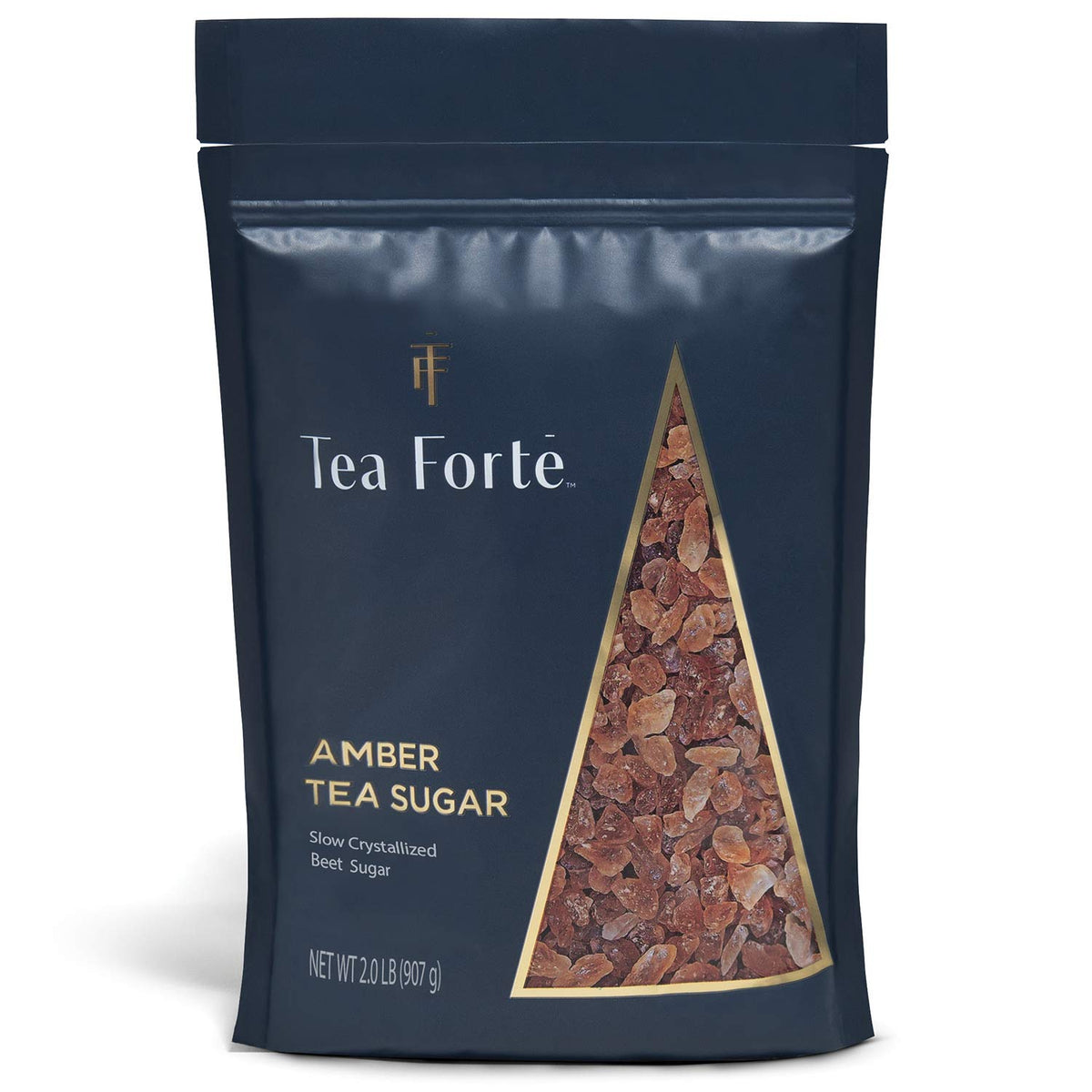 Tea Forte amber hue beet rock sugar crystals dissolving quickly in tea.