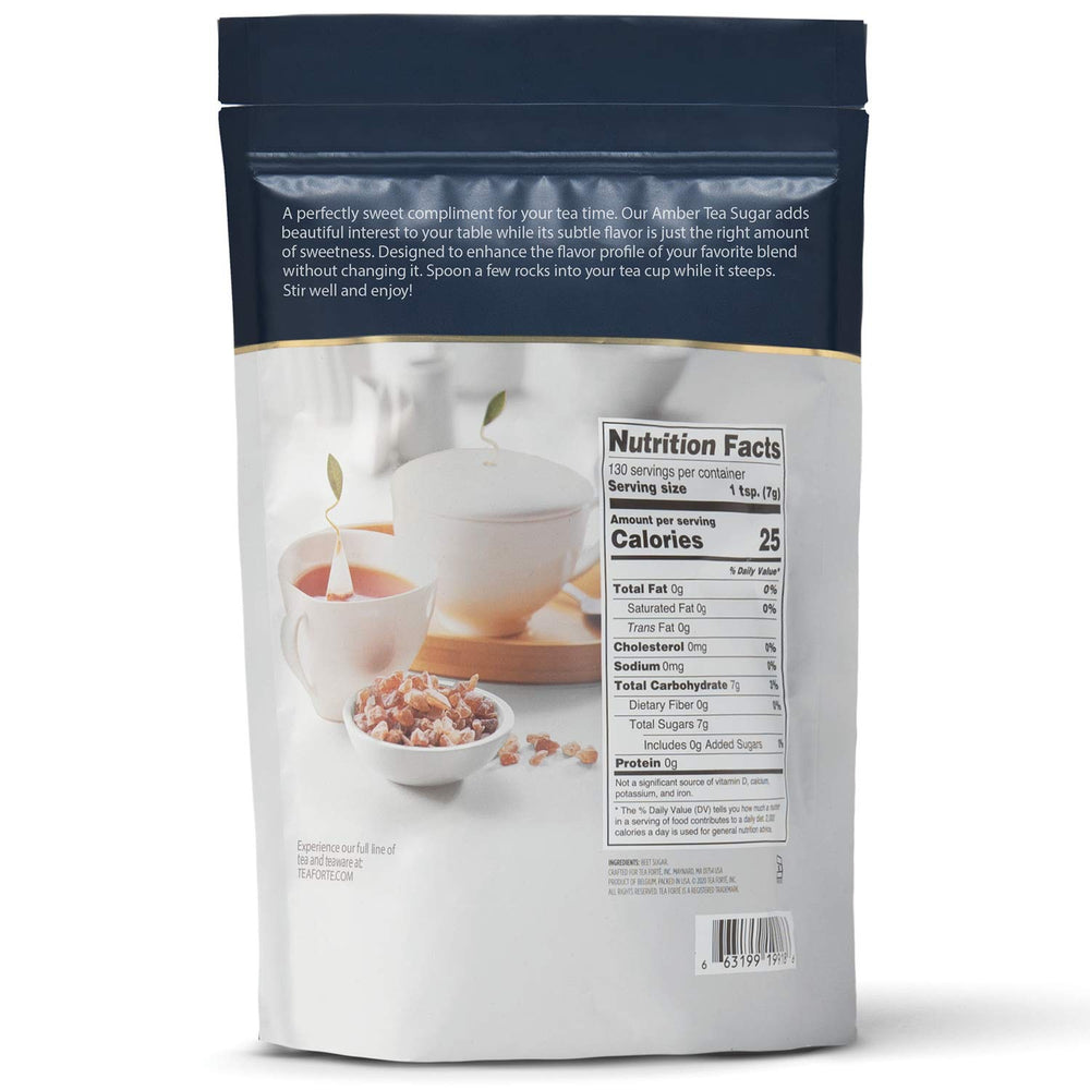 Tea Forte amber hue beet sugar crystals stirred into tea during steeping.