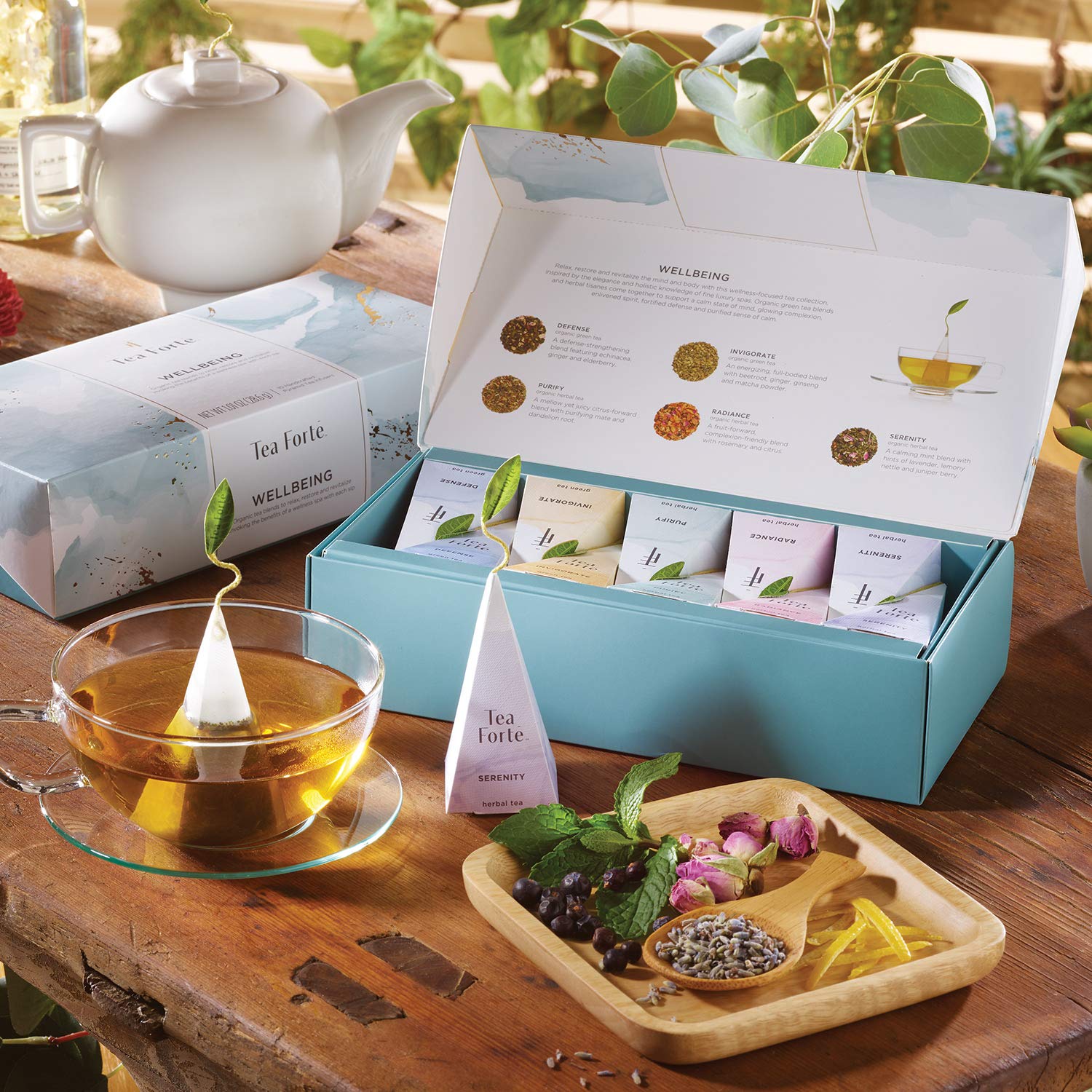 Tea Forte Radiance pyramid tea bag close-up, fragrant blend brightens afternoons.