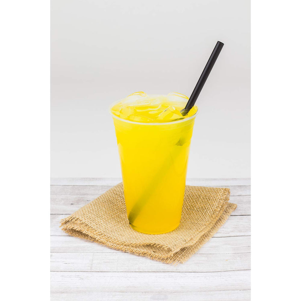Tea Zone Peach Syrup splash in a cocktail glass for mixed drinks.